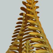 Lamp to lay on the foliage of golden ferns