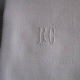 11 large old damask napkins, monogrammed