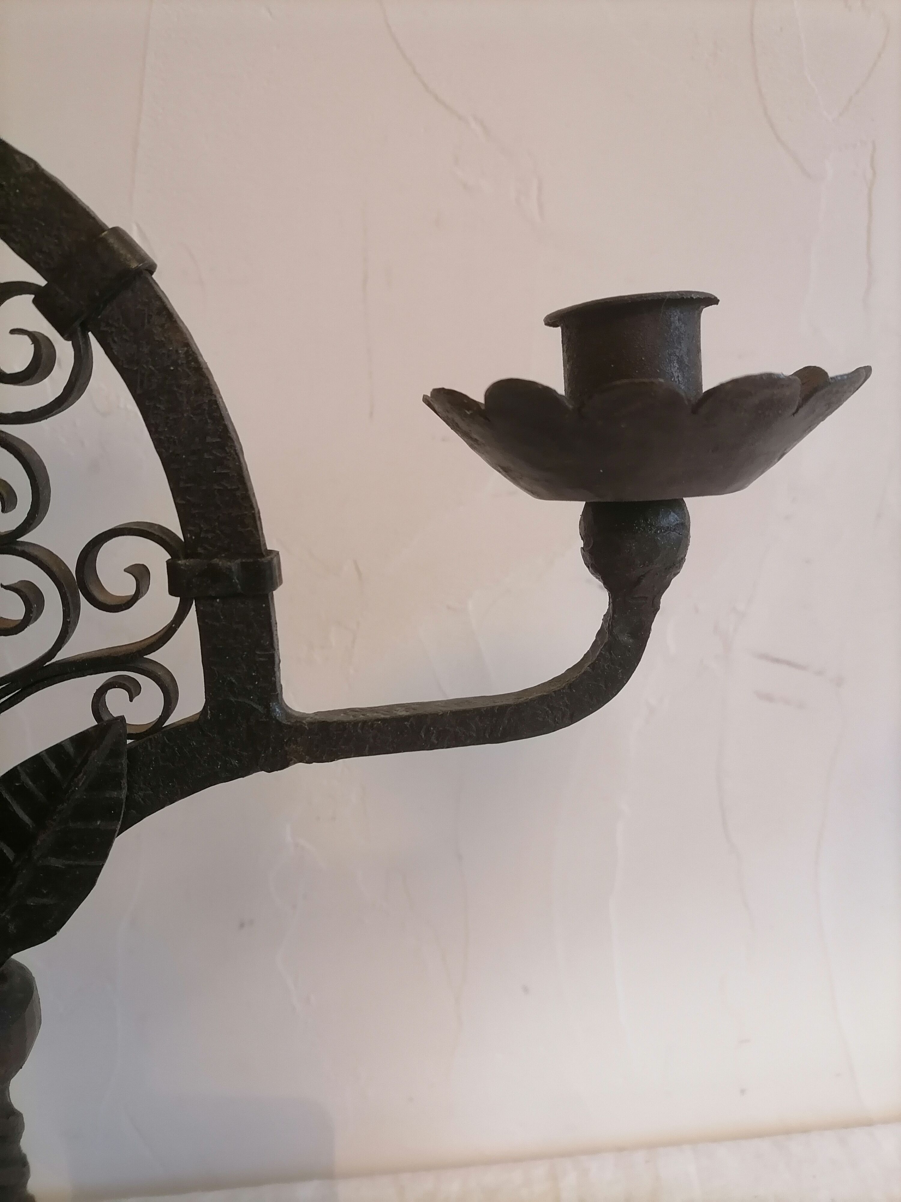 Pair of wrought iron candelabras. Mid-twentieth century.