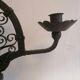 Pair of wrought iron candelabras. Mid-twentieth century.