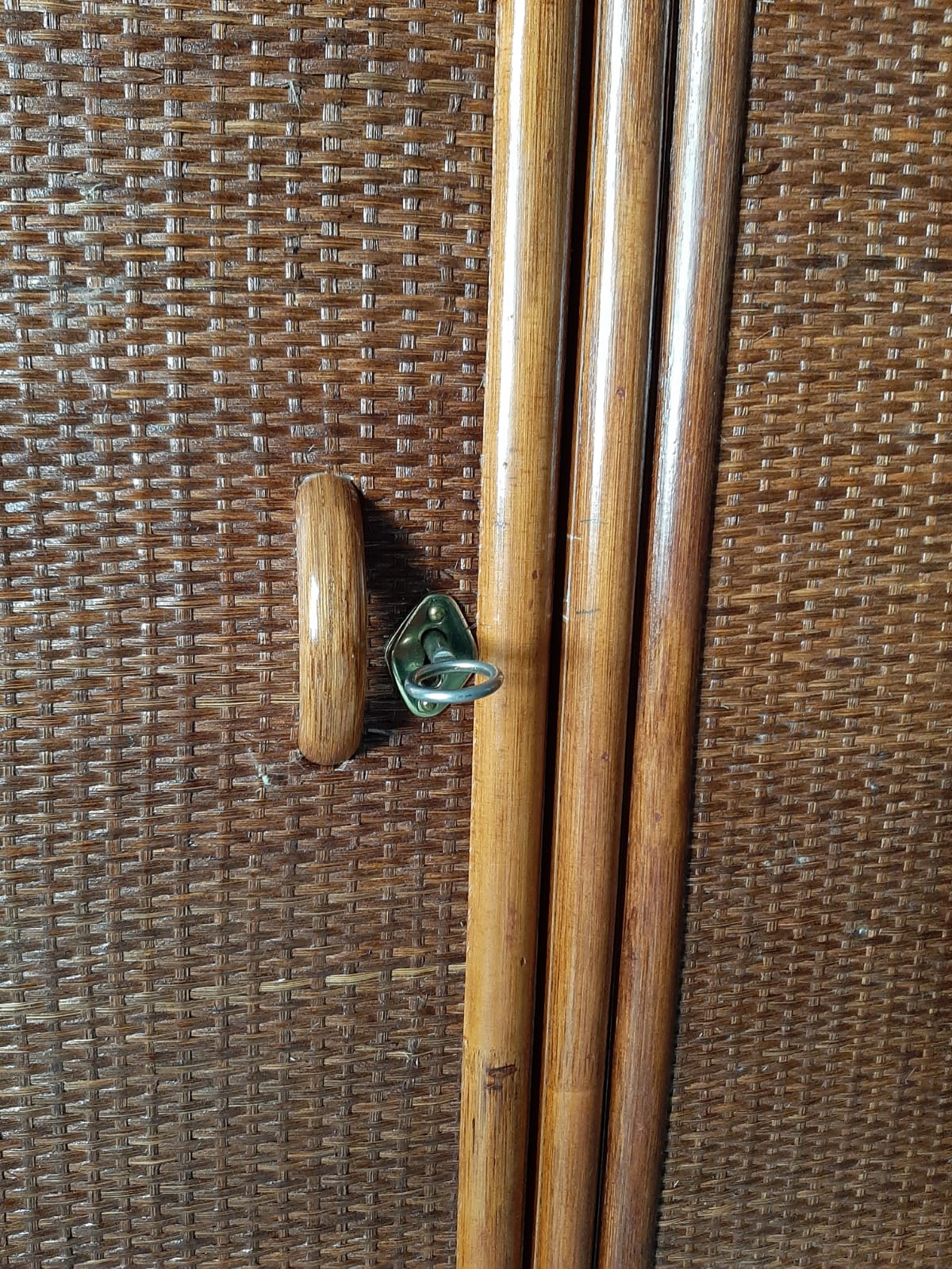 Brown varnished rattan cabinet