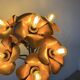 Ornamental floor lamp with "flower" patterns from the 1970s.
