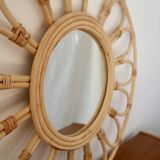 Vintage rattan and bamboo sun mirror