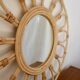 Vintage rattan and bamboo sun mirror