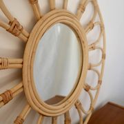 Vintage rattan and bamboo sun mirror