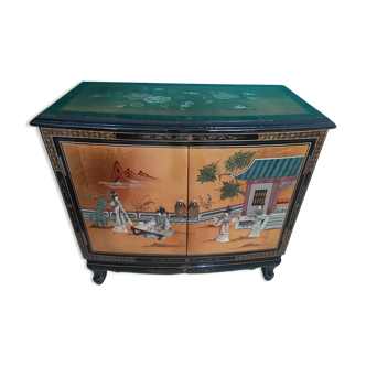 Buffet of black and gold laqué Chinese storage with relief subjects decorated flowers painted birds