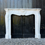 Louis XV style fireplace in Carrara marble, around 1900.