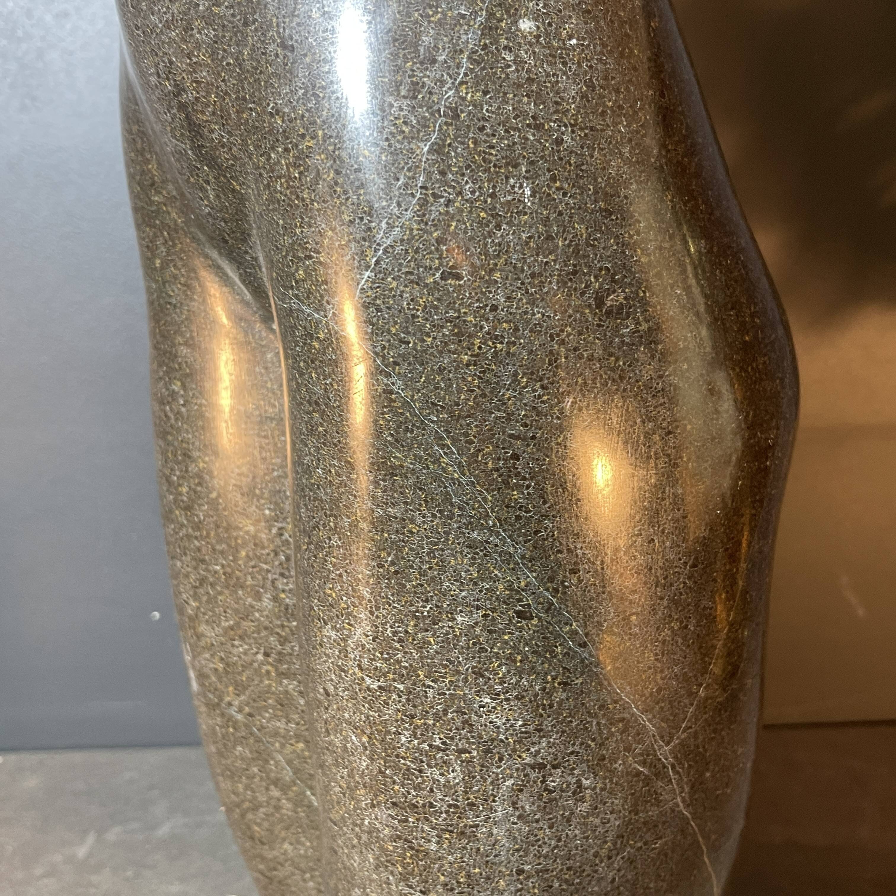 Abstract sculpture "naked woman" in stone (black marble), signed work, 20th century