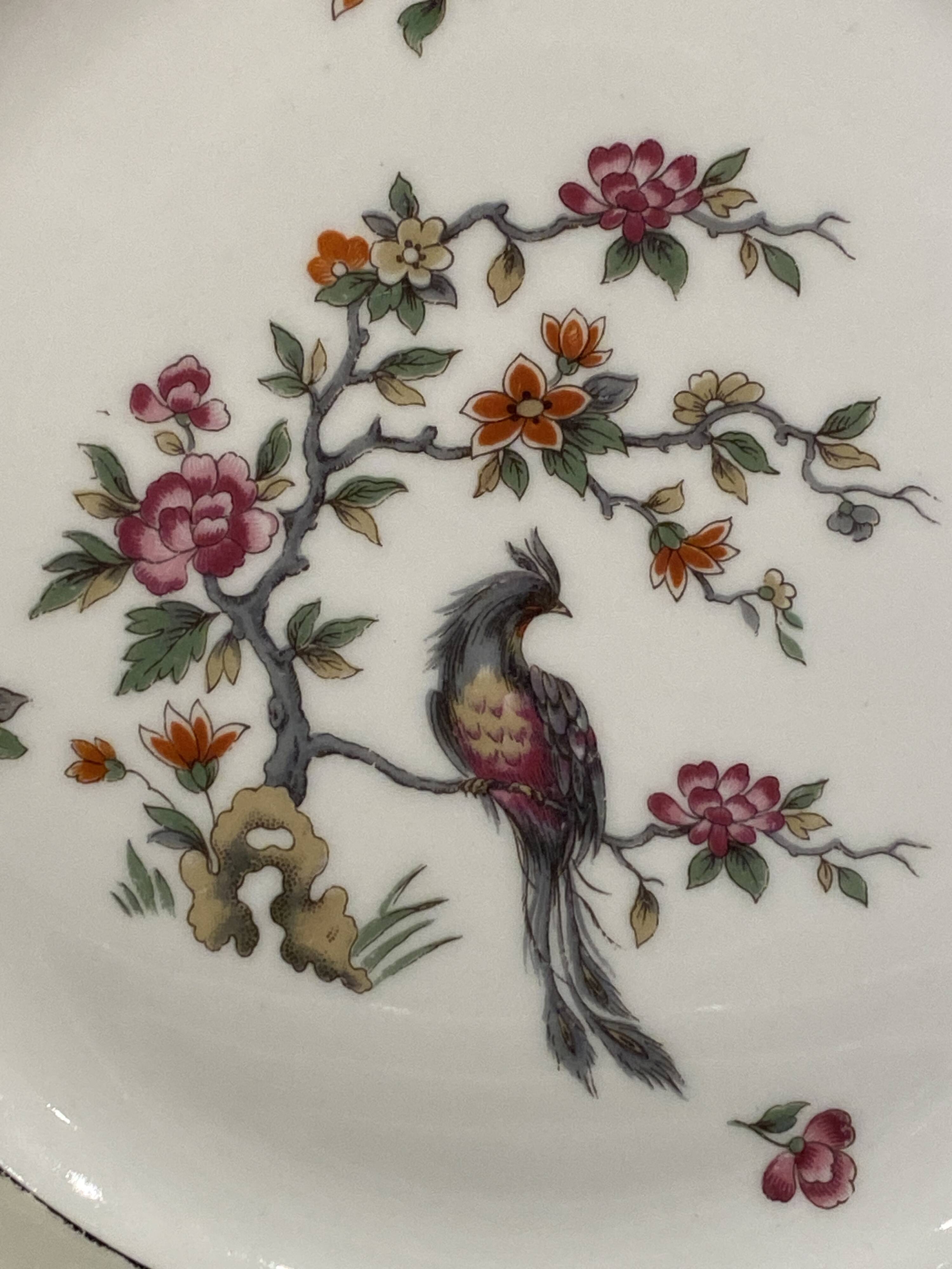 Set of 8 flat plates in Limoges porcelain