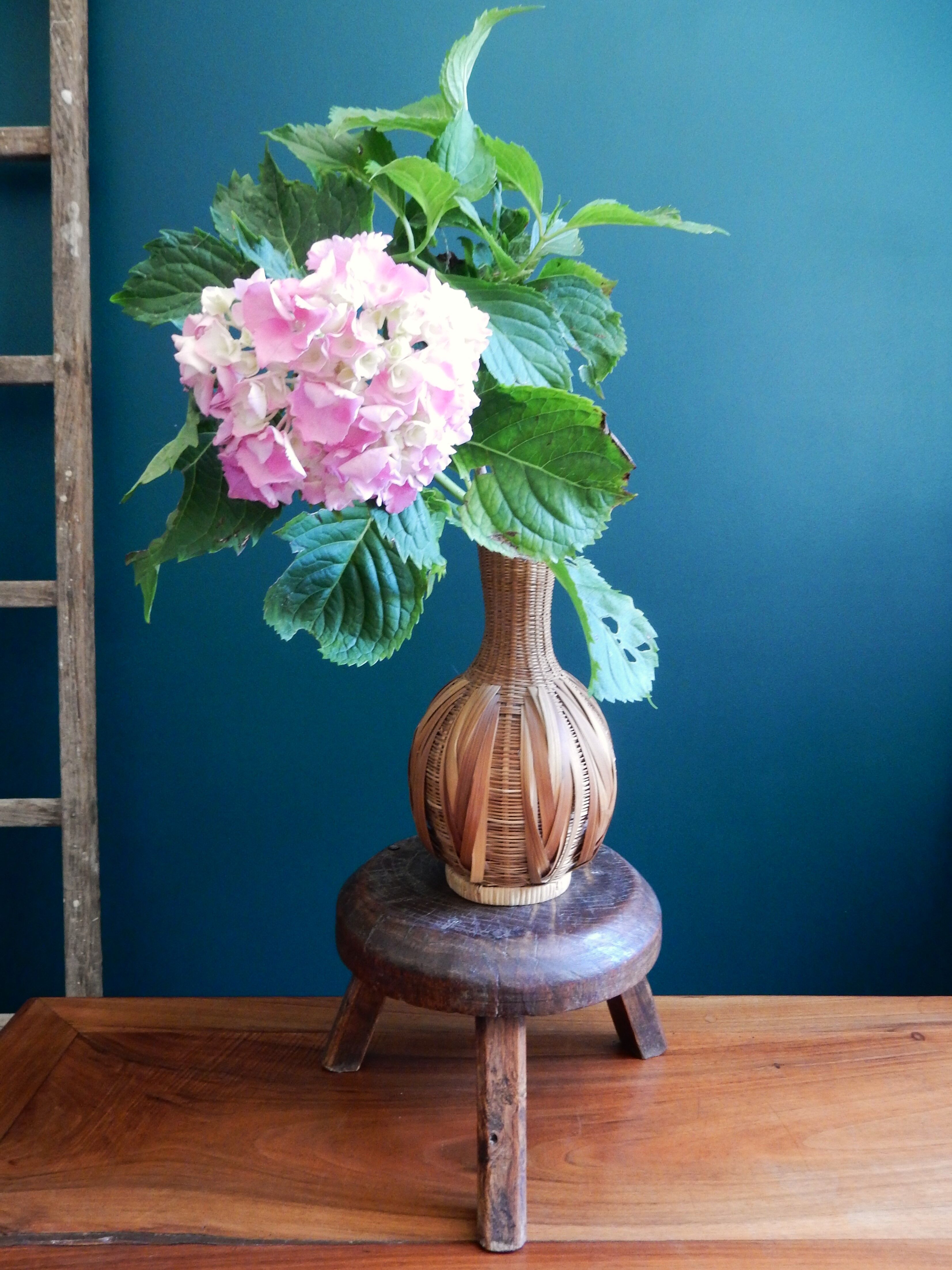 Small wooden farm tripod stool