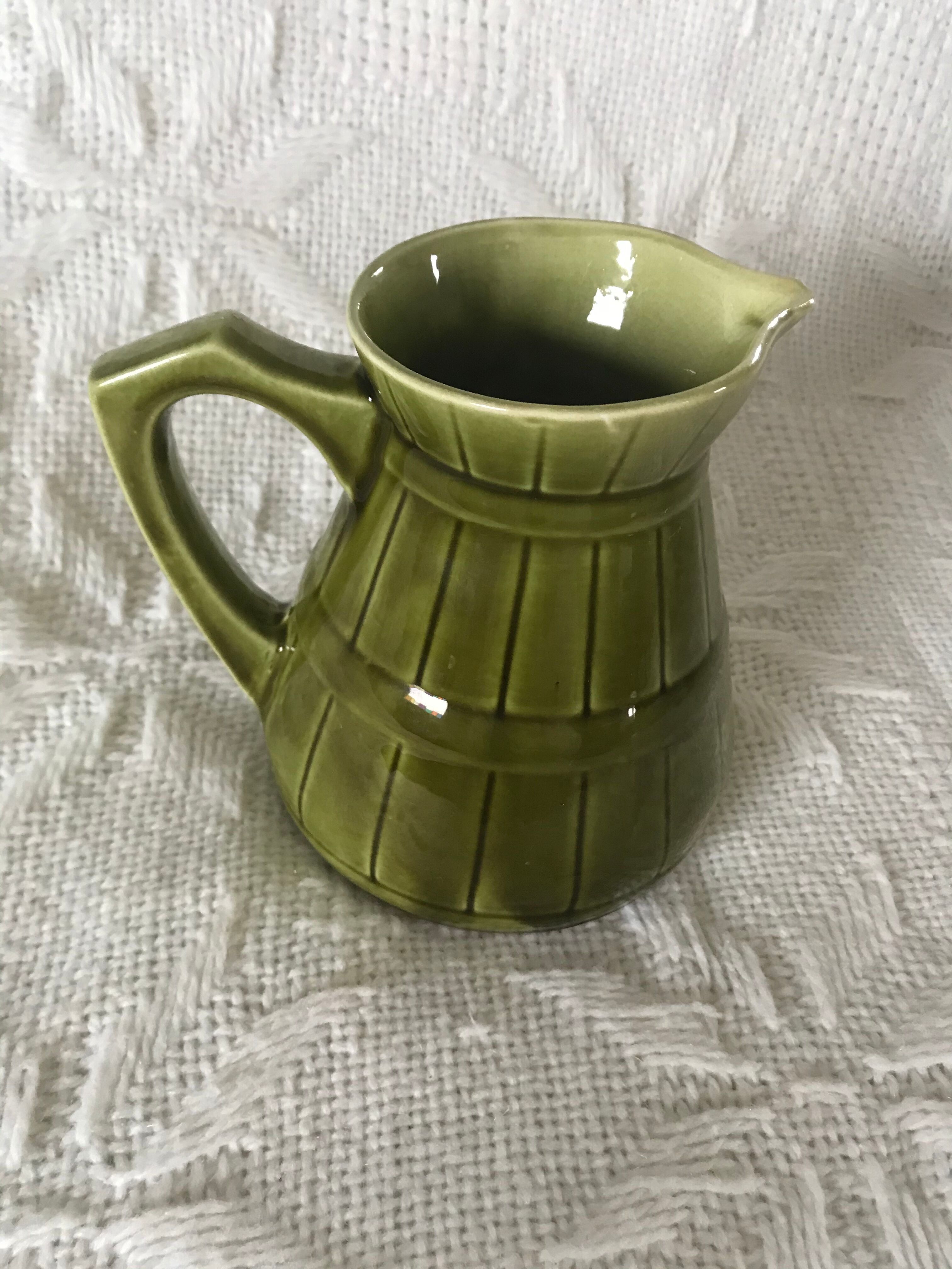 Olive green ceramic pitcher