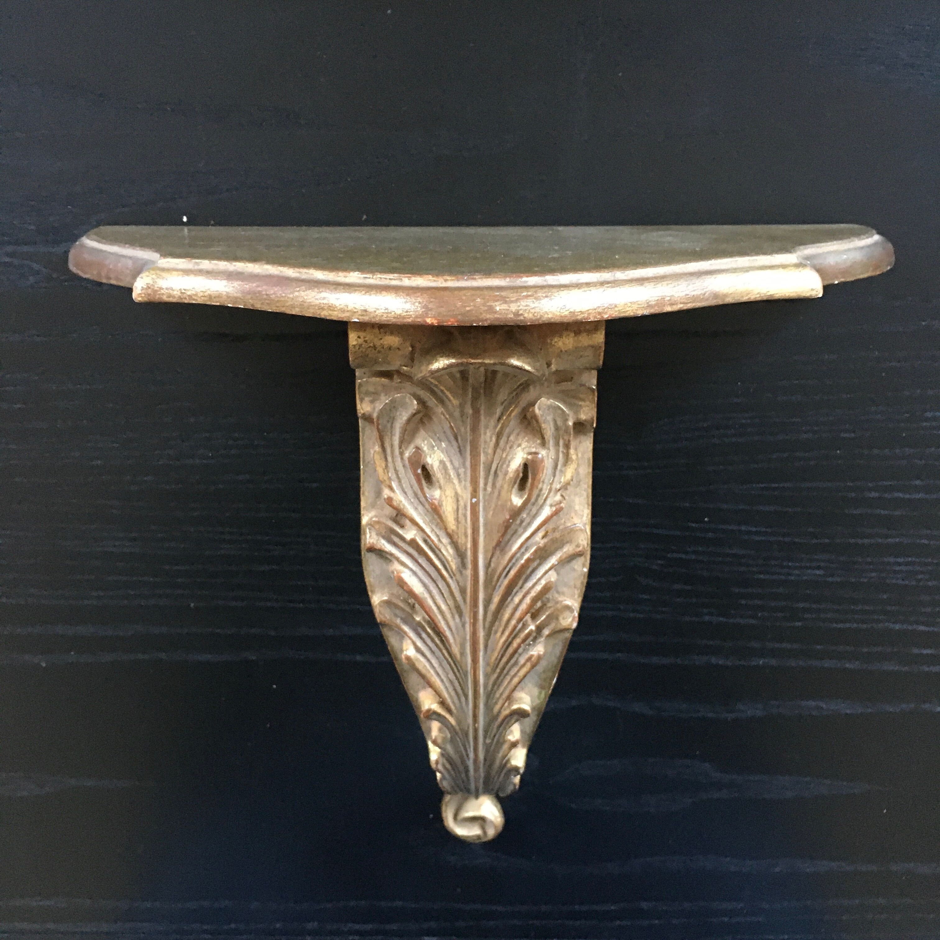 Gold patinated wall console