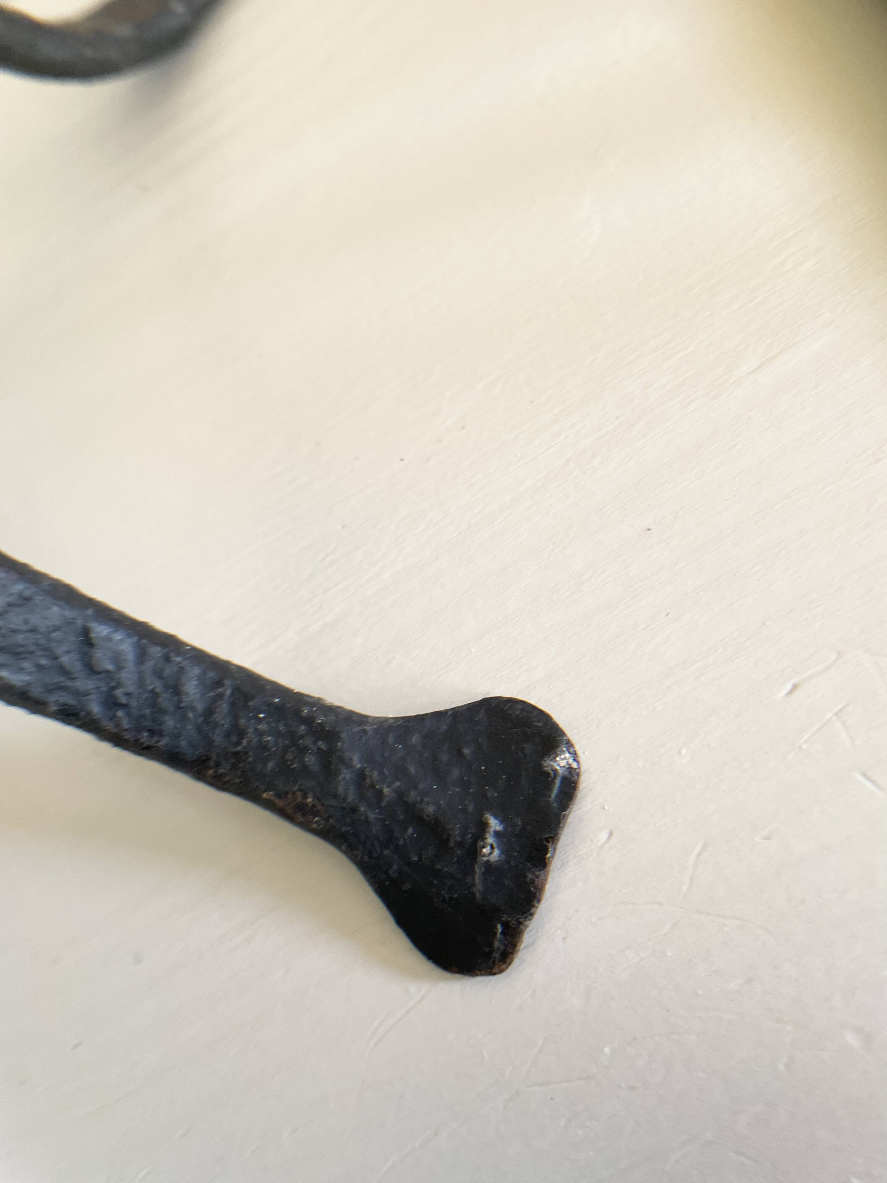 Wrought iron candlesticks