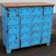 Old blue metal locker with wooden top