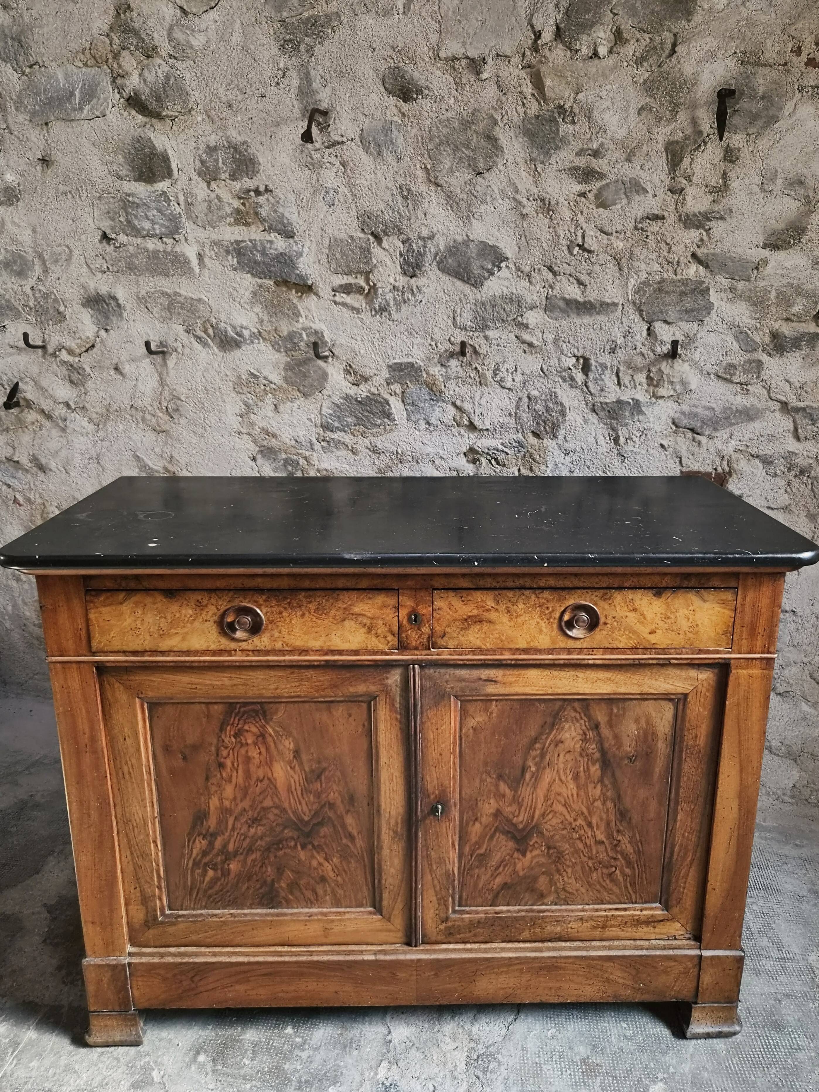 French Louis Philippe walnut buffet with black marble top, France, circa 1840–1860.