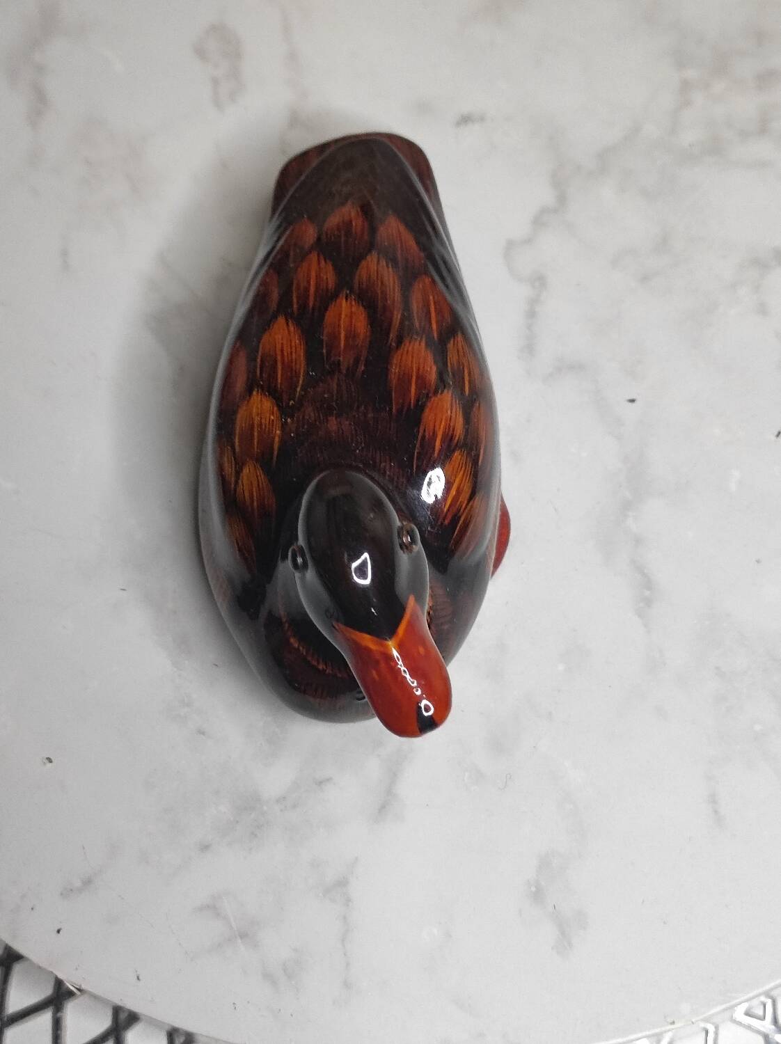 Antique duck figurine