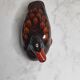 Antique duck figurine