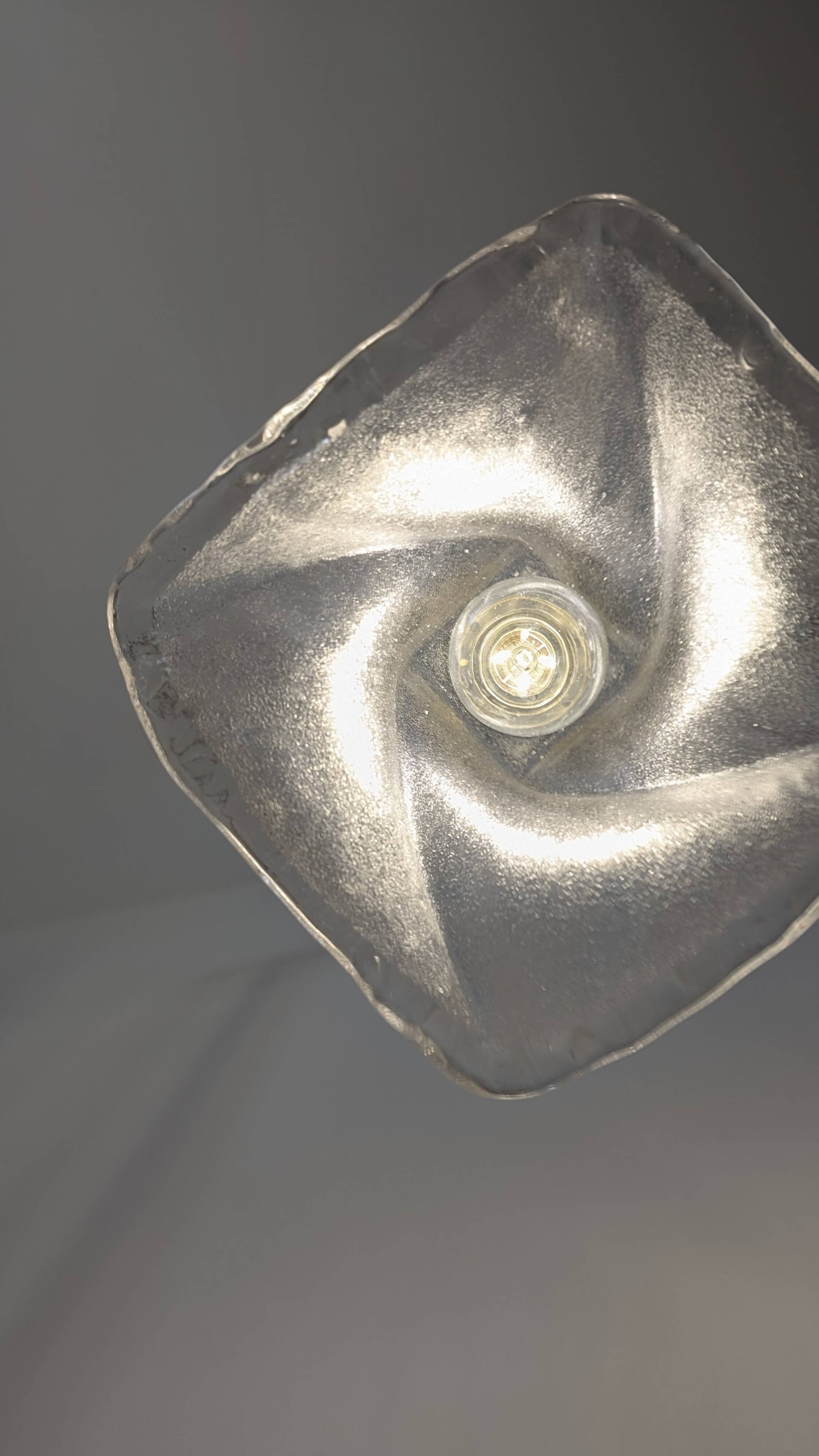 Pair of granite glass and brass pendant lights – poetic elegance