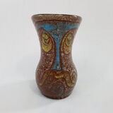 Accolay décor of face ceramic vase