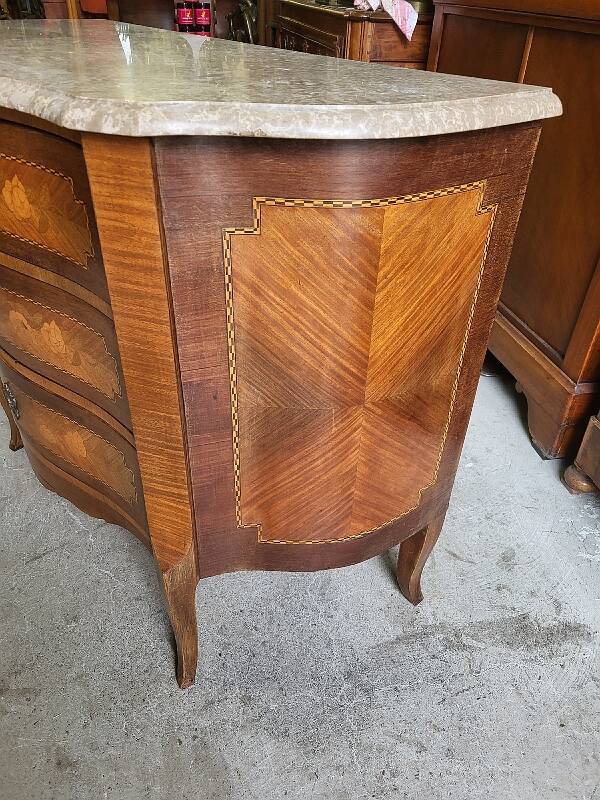 Curved chest of drawers in rosewood and marble marquetry
