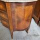 Curved chest of drawers in rosewood and marble marquetry