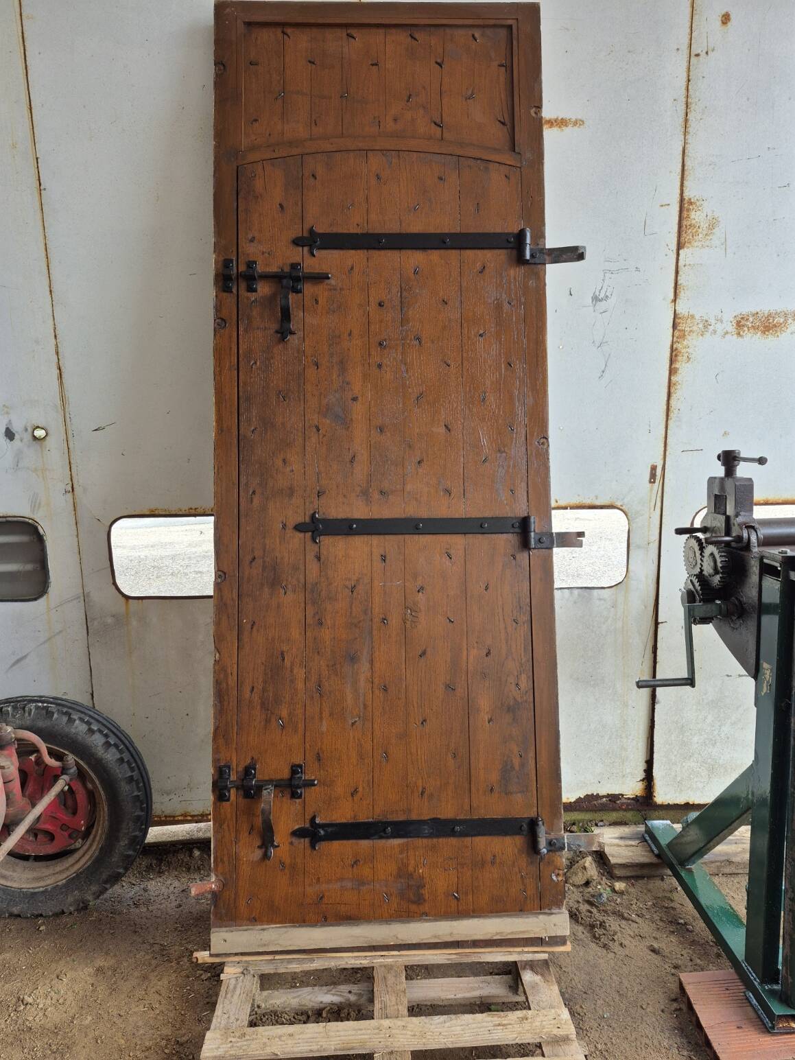 hand-forged studded castle doors + frame from the 1800s/1900s