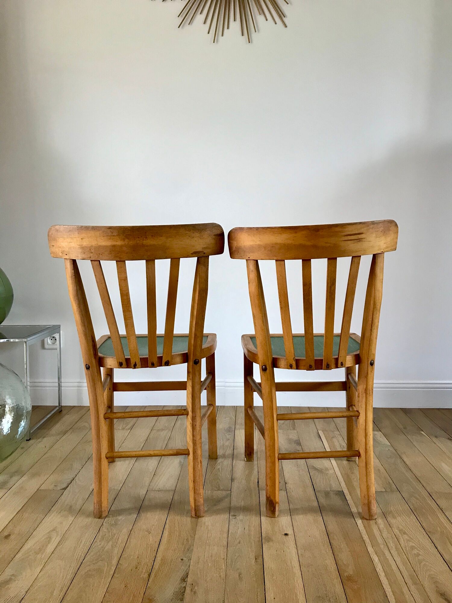 Pair of bistro chairs in light curved wood and green seat 1950s