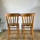 Pair of bistro chairs in light curved wood and green seat 1950s