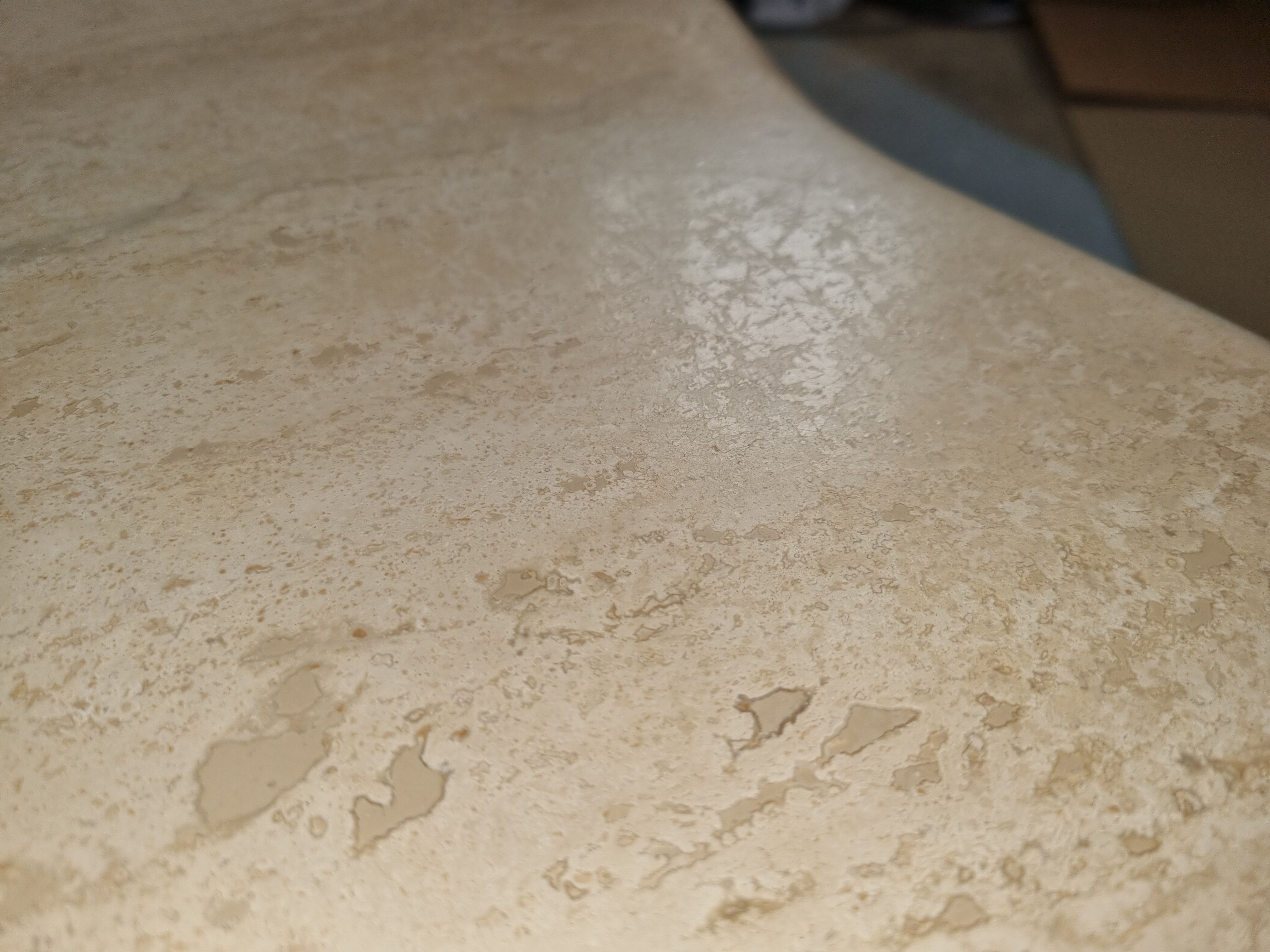 Vintage "cloud" coffee table in travertine, 80s