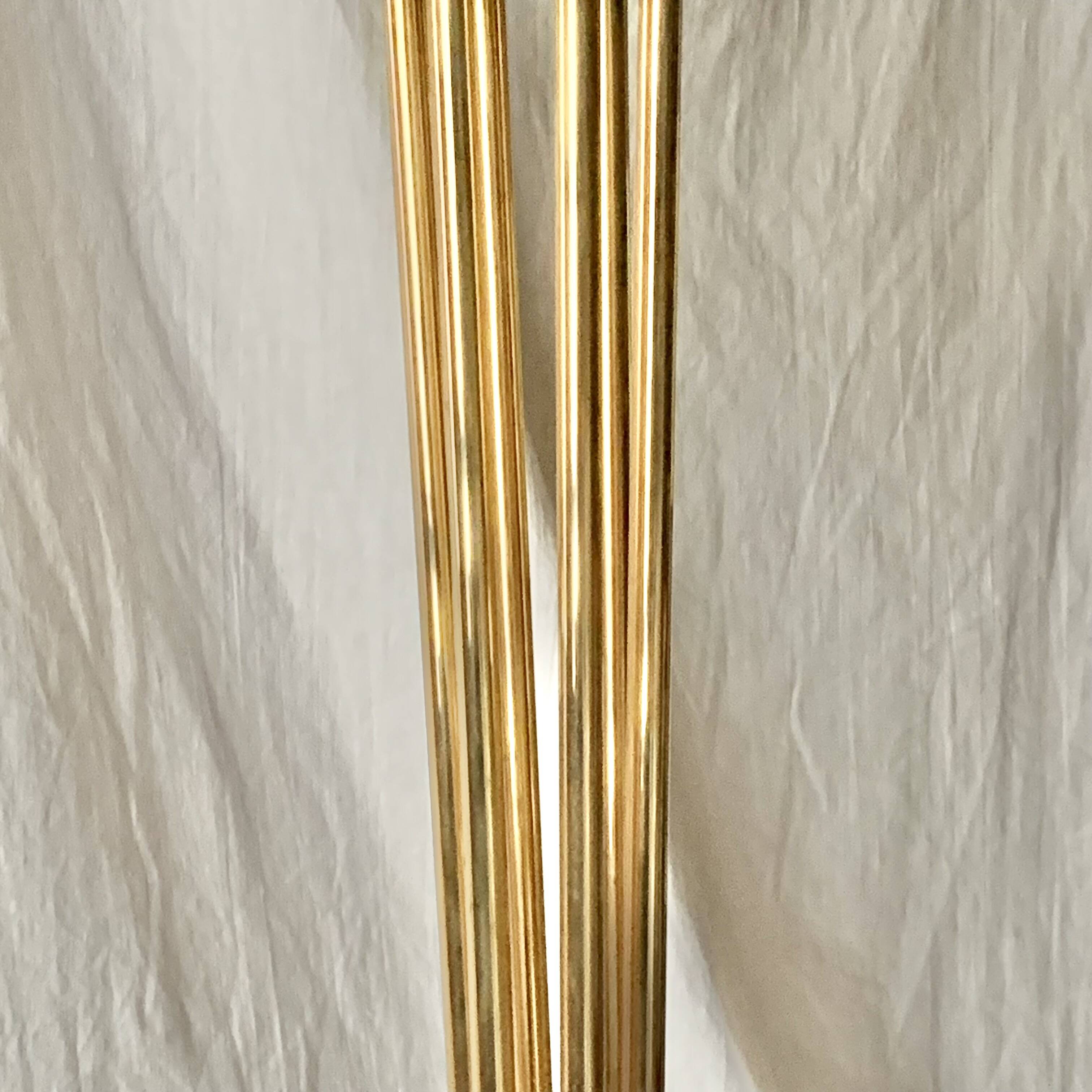 Old brass and chrome-plated metal ashtray on stand