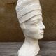 Young girl bust in plaster