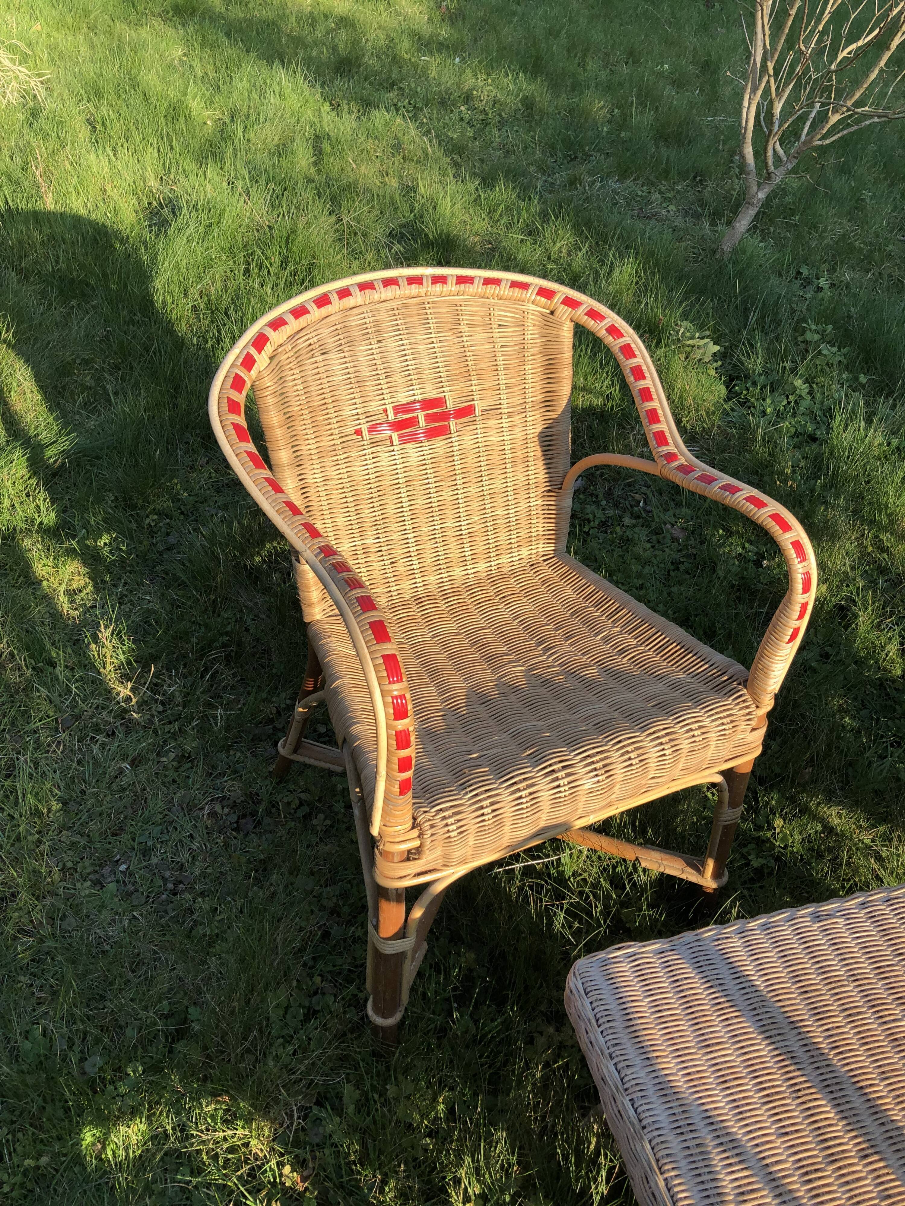 Rattan garden armchairs and coffee table