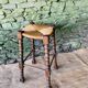 High wooden turned stool