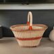 Old oval basket with a wooden base