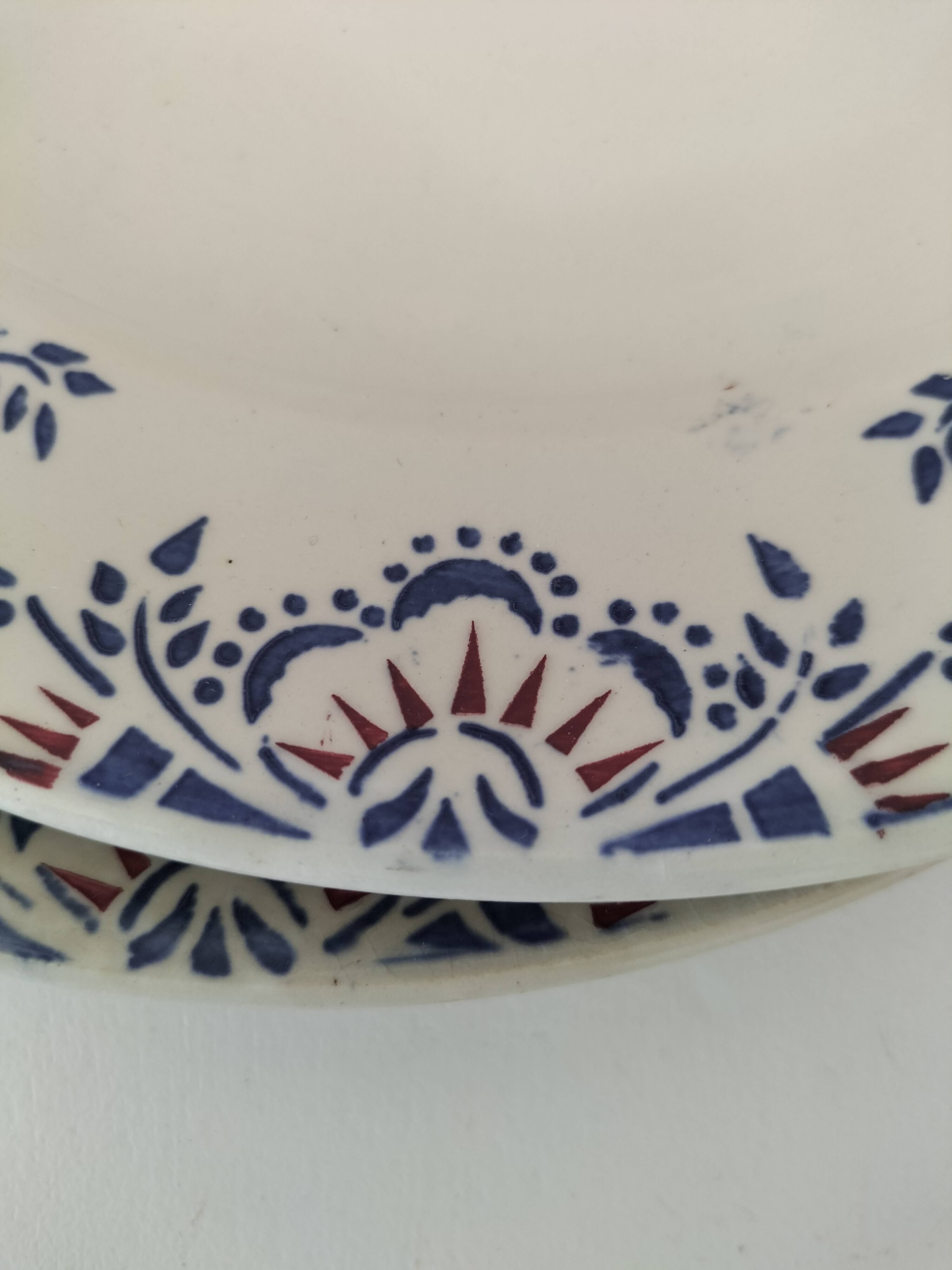 Pair of ironstone plates from Onnaing – blue and red decoration, 19th century