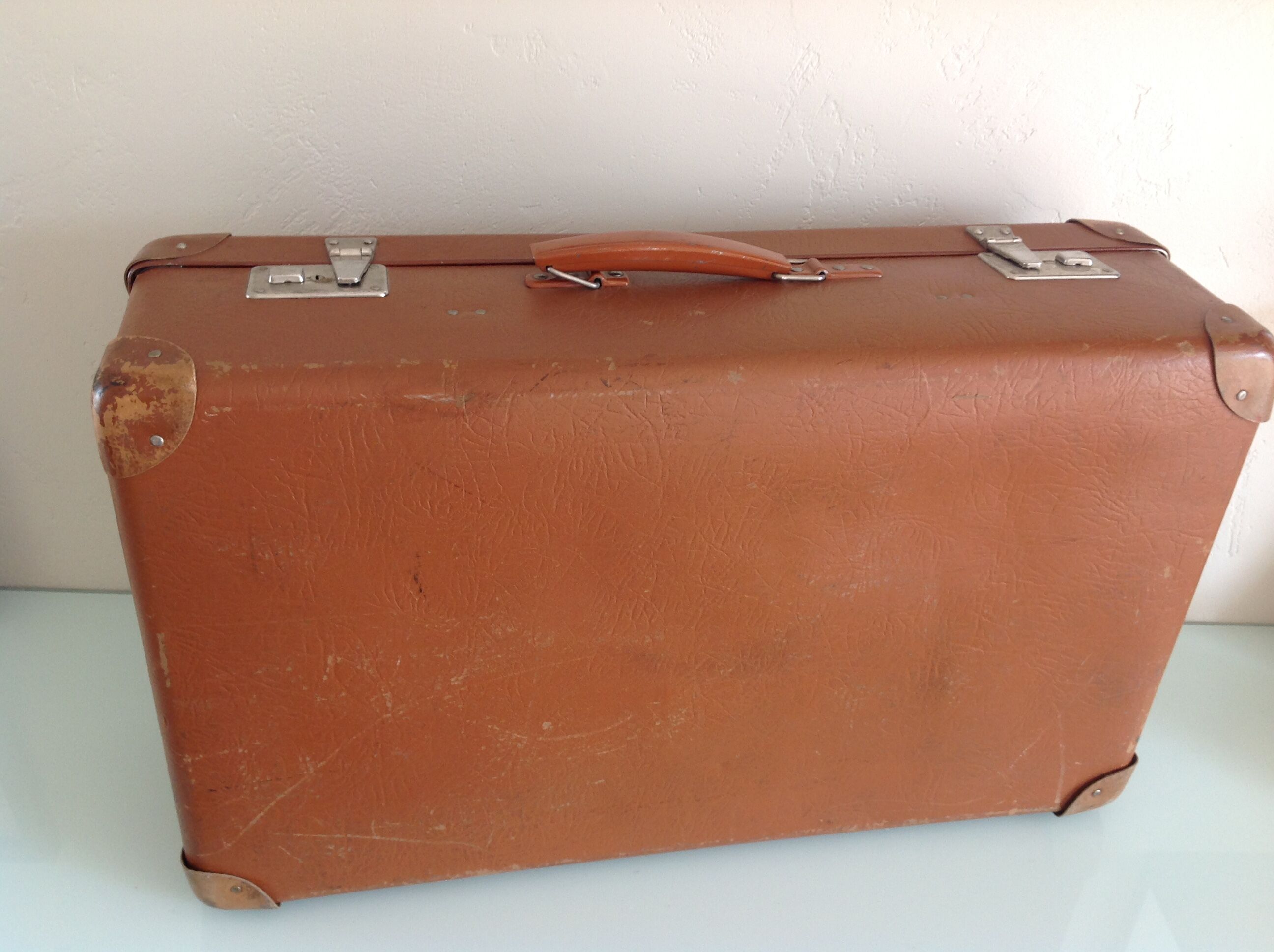 Light brown vintage suitcase