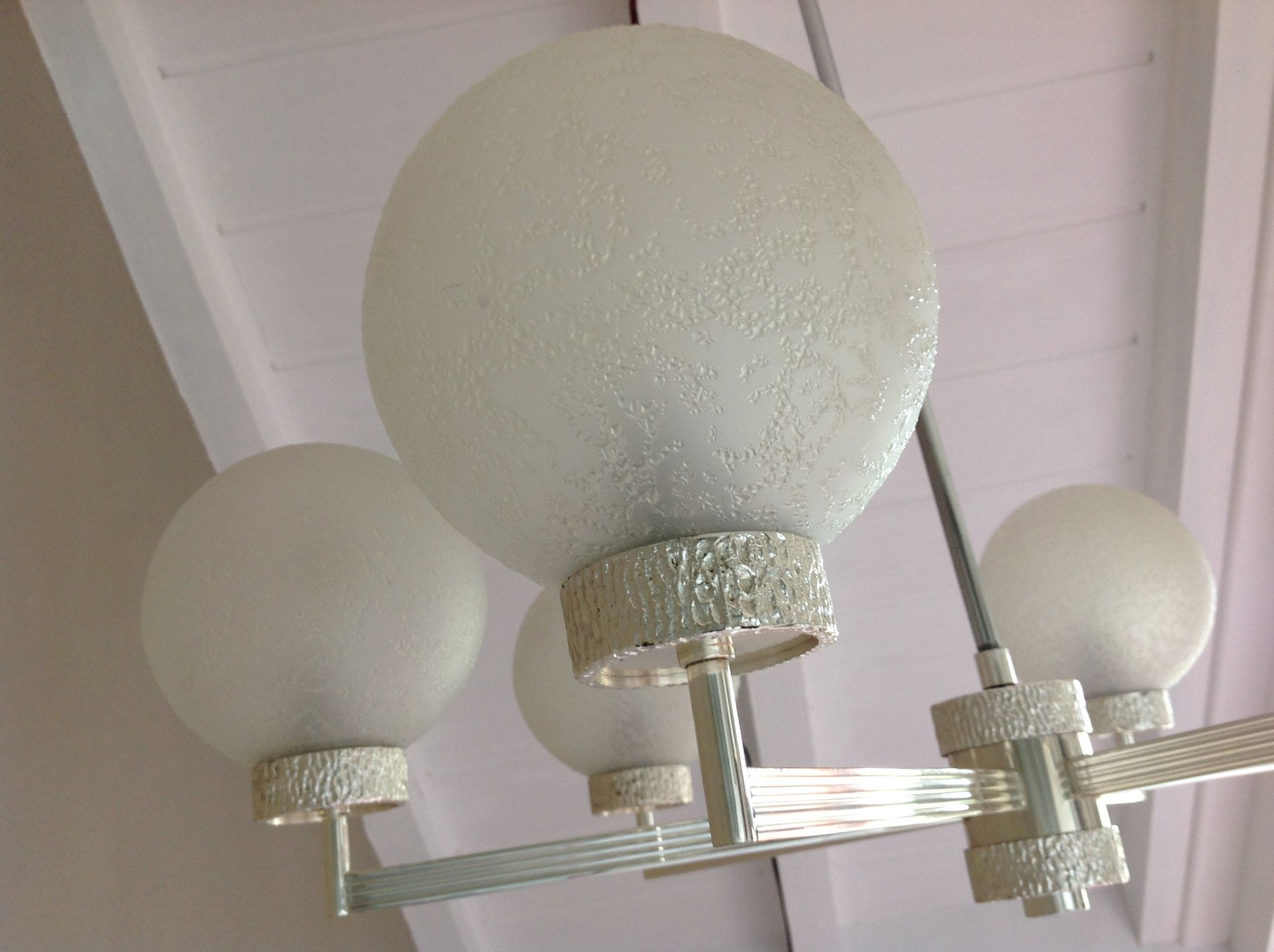 Six-light chrome metal chandelier and opaque glass globes / vintage 60s and 70s