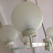 Six-light chrome metal chandelier and opaque glass globes / vintage 60s and 70s