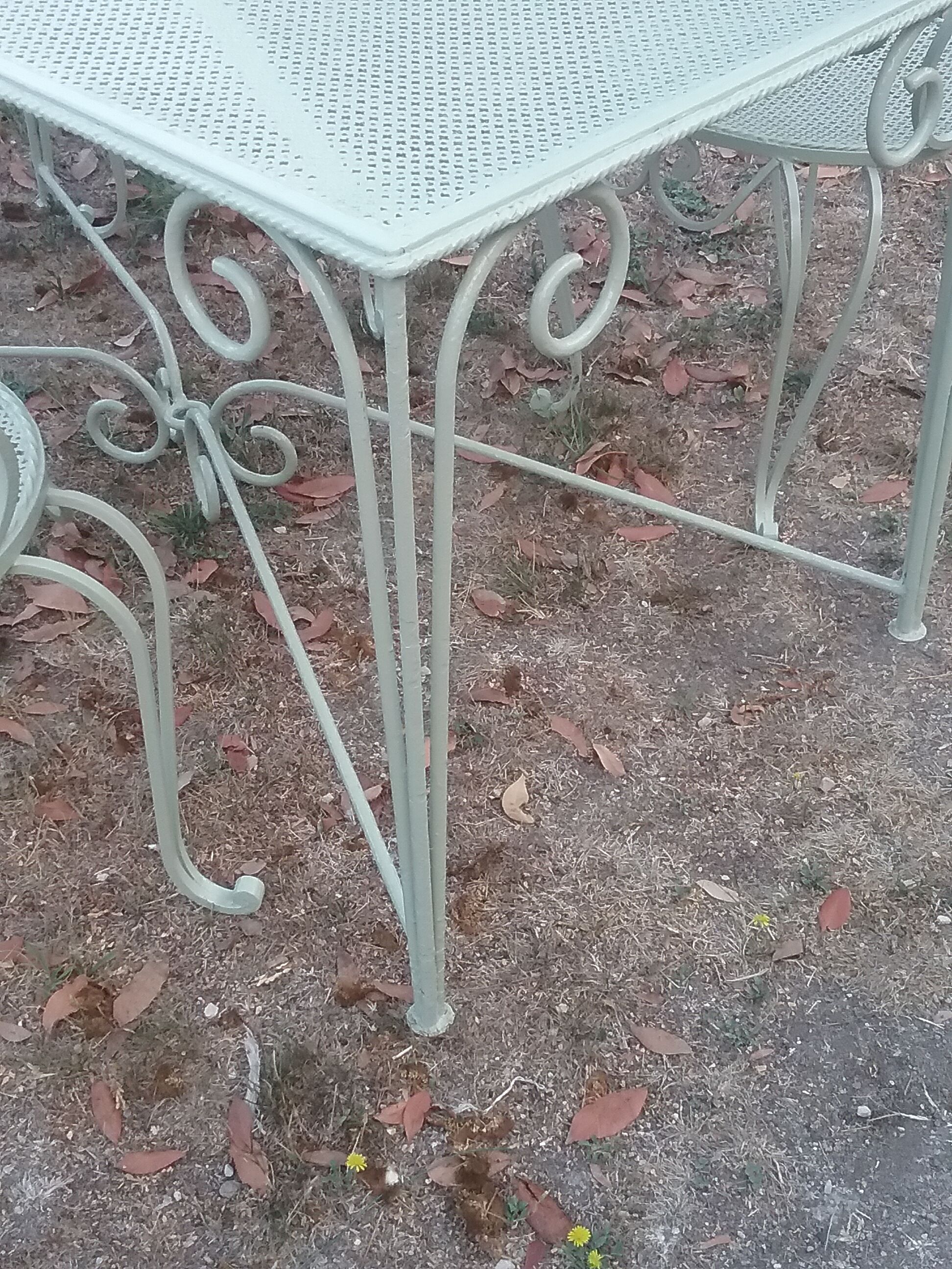 Garden furniture in green wrought iron