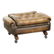 Ottoman chesterfield anglais en cuir élégant, fini avec des clous décoratifs.