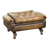 Elegant cowhide English chesterfield ottoman finished with decorative nails