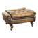 Ottoman chesterfield anglais en cuir élégant, fini avec des clous décoratifs.