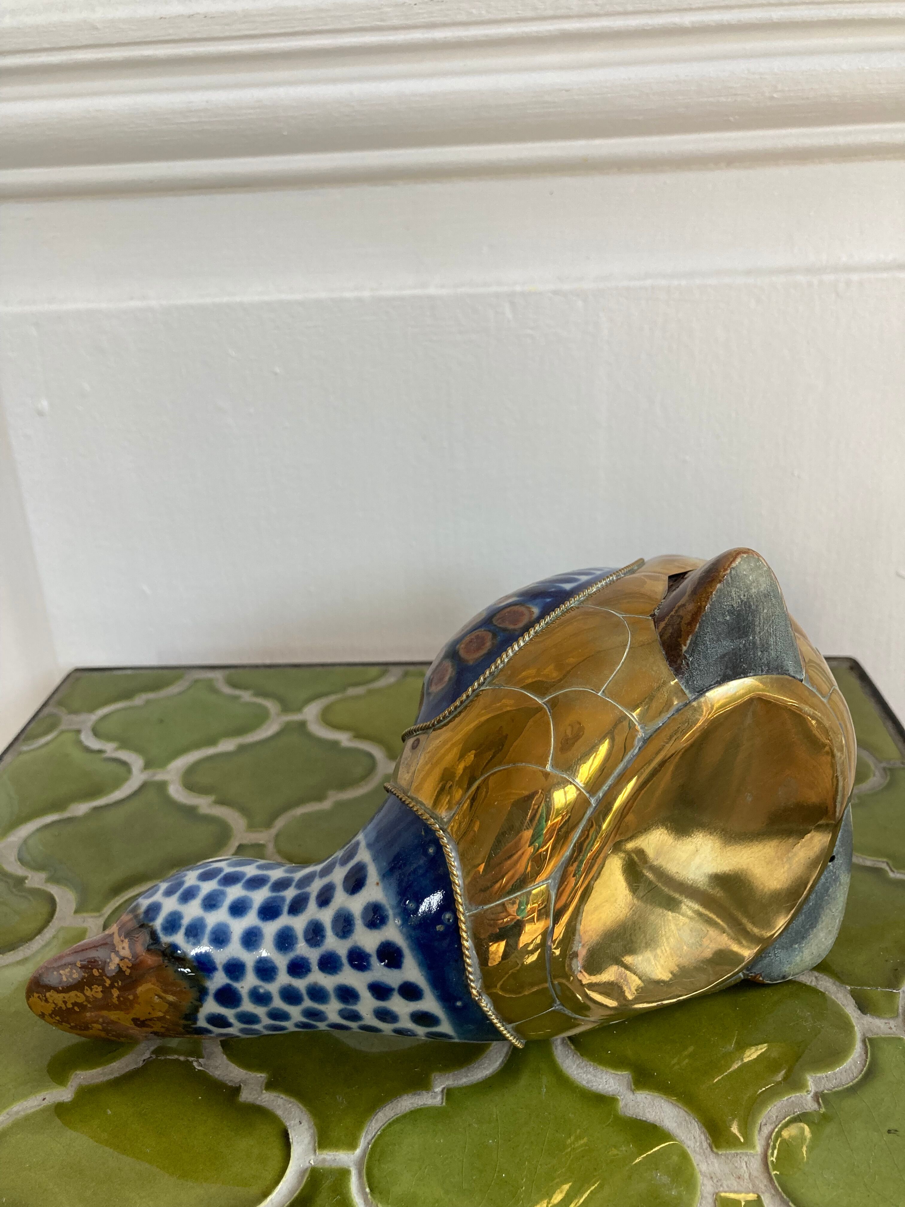Brass duck and ceramic
