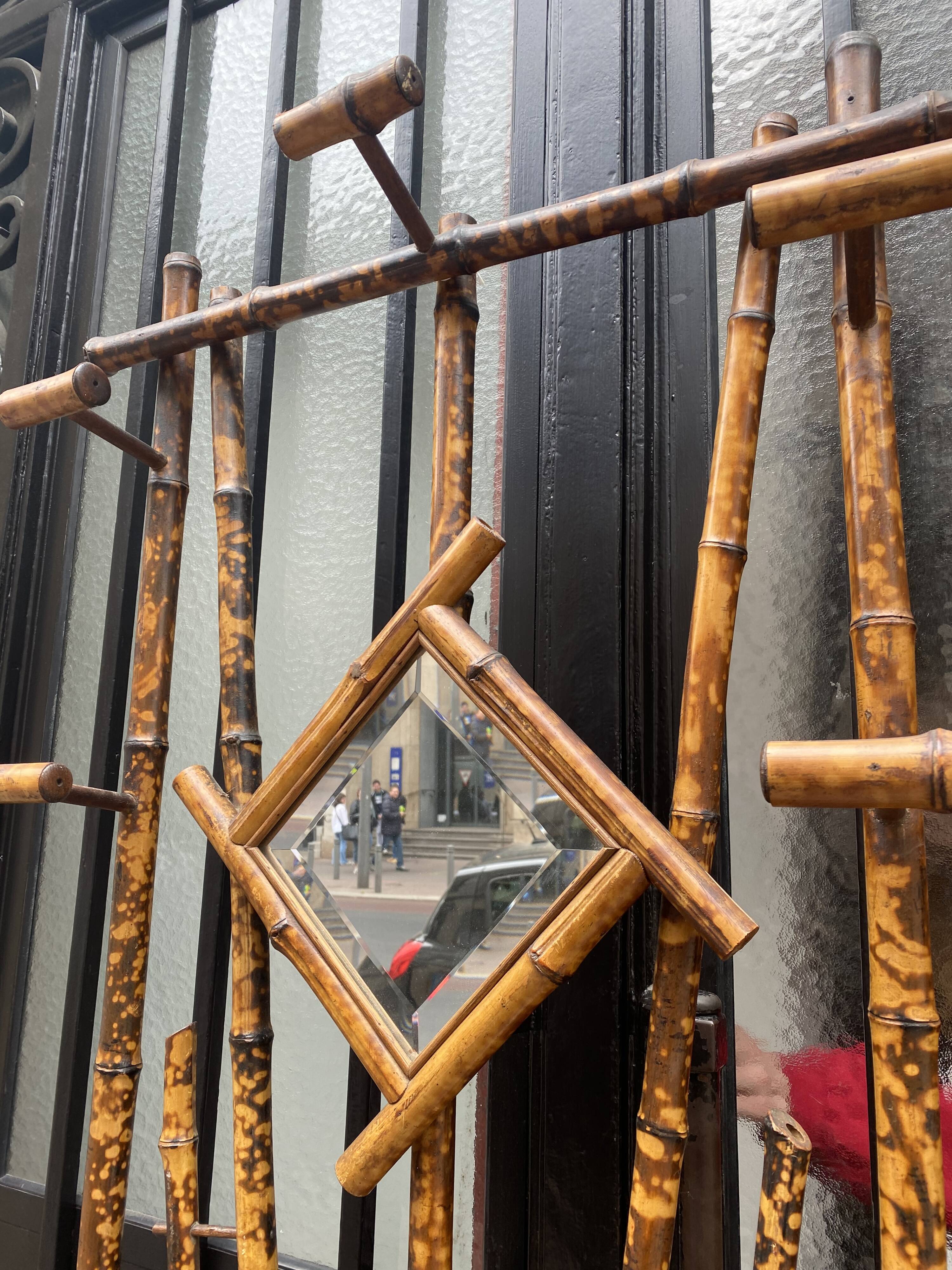 Vintage patinated bamboo coat holder