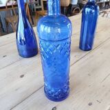 3 blue bottles