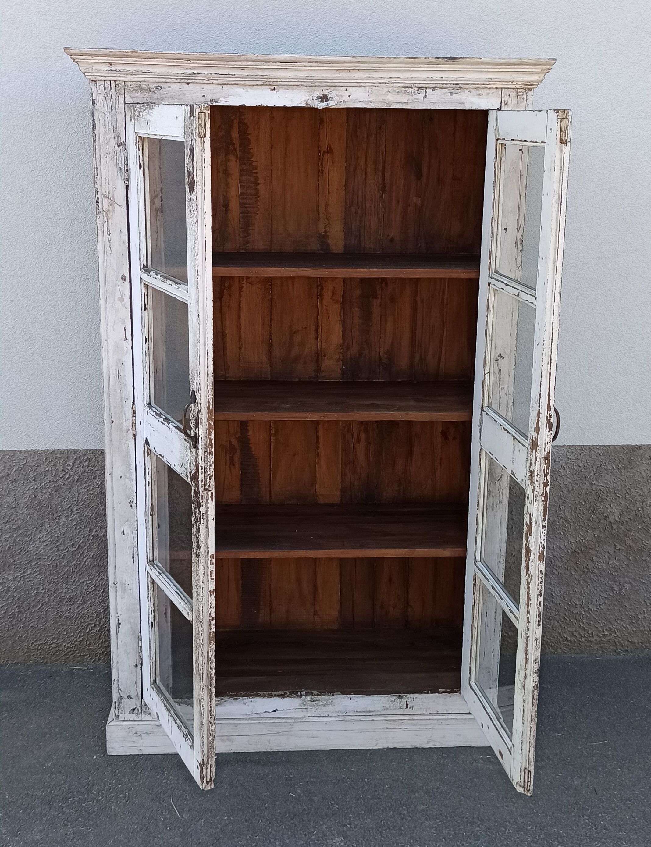 White wooden antique glazed wardrobe