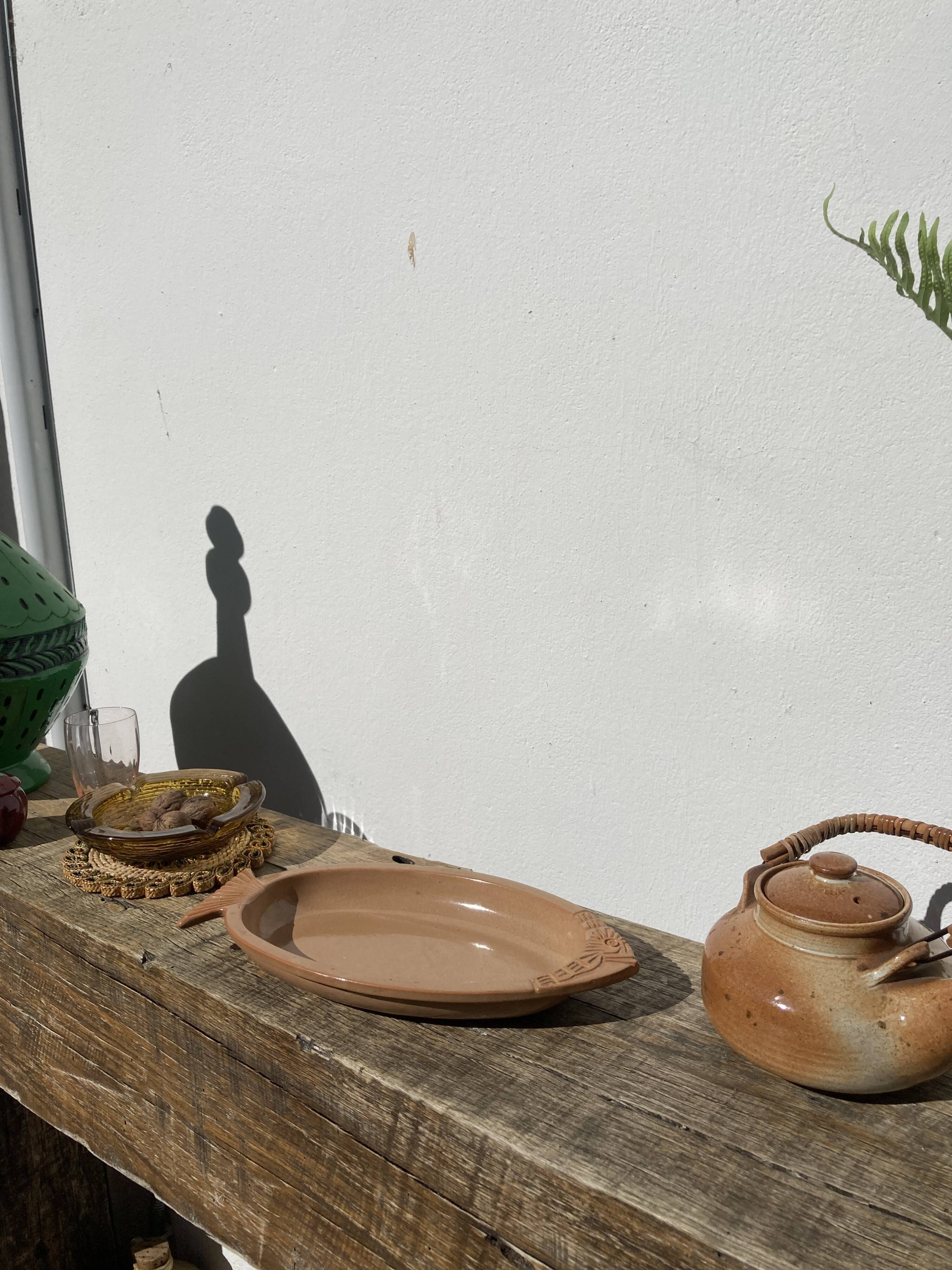 Oval brown ceramic fish dish