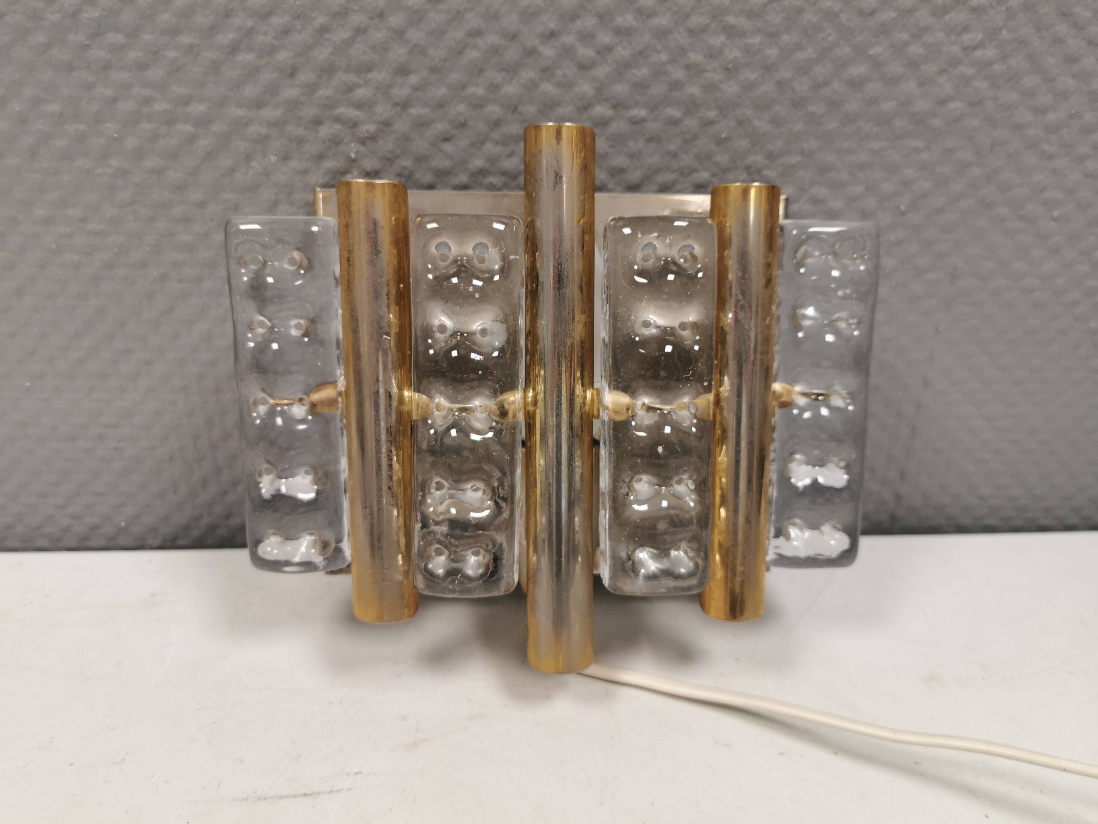 Old Swedish wall lamp, made of hard pressed glass, brass and metal 1960s