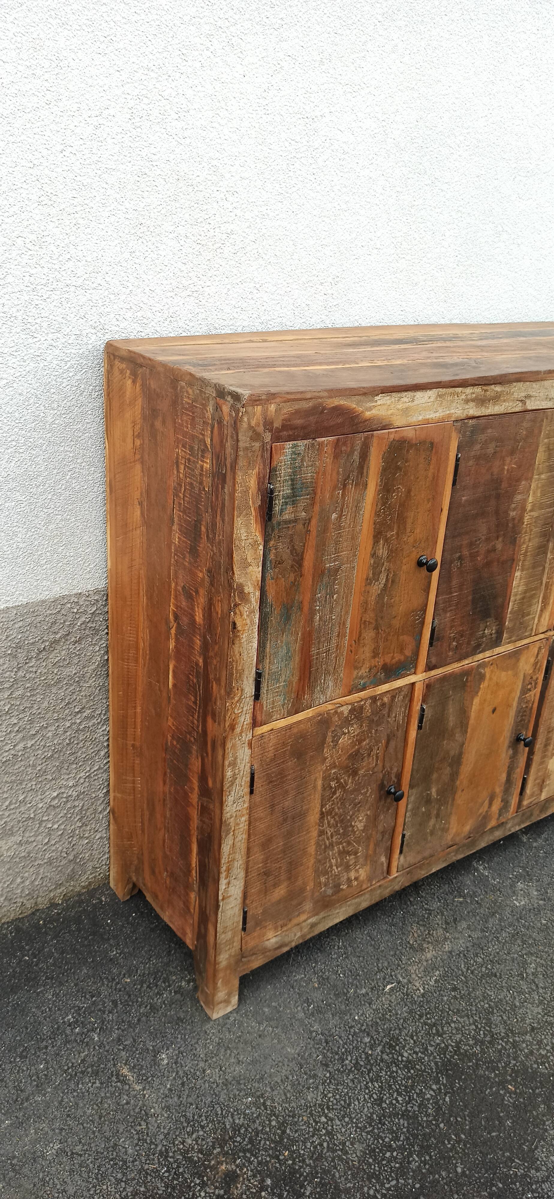 Old wooden cabinet. 8 doors.