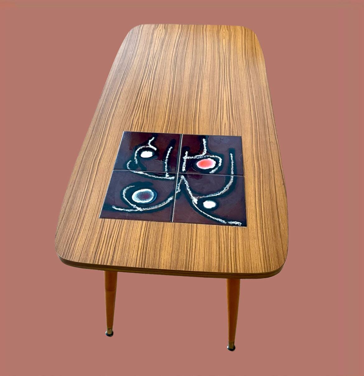 Rosewood veneer and ceramic coffee table, circa 1960